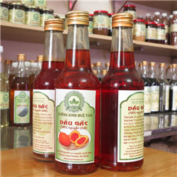 Bán Dầu gấc Huệ Tâm 300ml - Sản phẩm tự nhiên